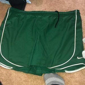 Green Nike shorts